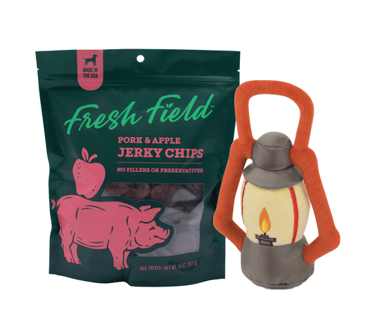 A photo of the Fresh Fields Pork and Apple Jerky Chip Treat and Pack Leader Lantern toy bundle. This bundle is from Fresh Fields by Colorado Pet Treats and P.L.A.Y.